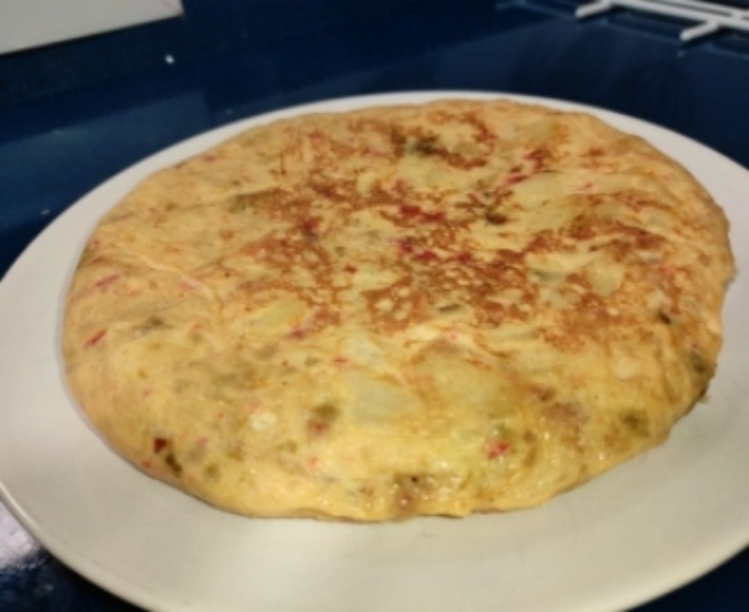 Tortilla de patatas con pimientos asados Tortilla de patatas con pimientos asados
