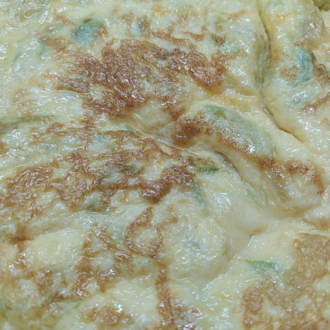 Tortilla de calabacín, cebolla y queso Tortilla de calabacín, cebolla y queso