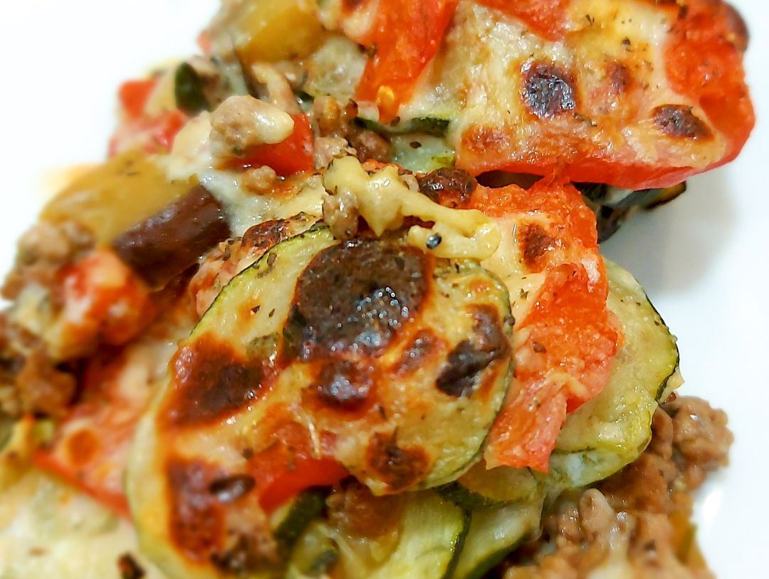Medallones de berenjena y calabacin con seitán gratinadas Medallones de berenjena y calabacin con seitán gratinadas