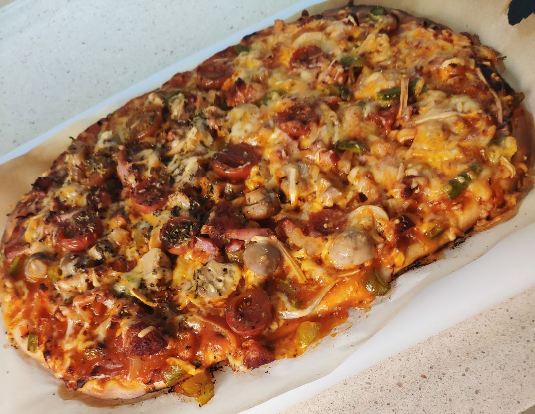 Pizza con masa casera Pizza con masa casera