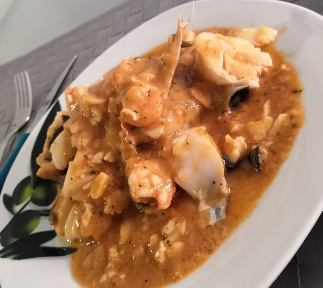 Bacalao 🐟 con salsa de 🦐 Bacalao 🐟 con salsa de 🦐