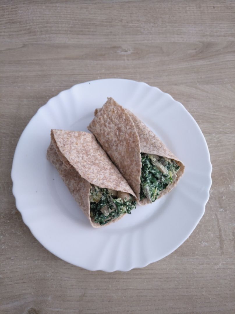 Wrap de espinacas, champis y ricota Wrap de espinacas, champis y ricota