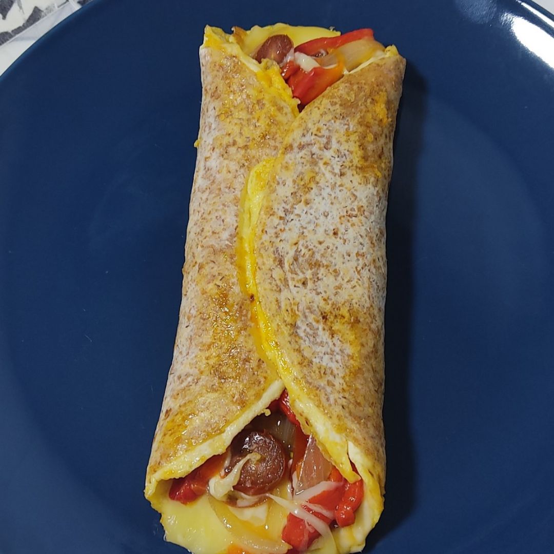 Wrap de tortilla, queso proteico escalivada y cherrys Wrap de tortilla, queso proteico escalivada y cherrys