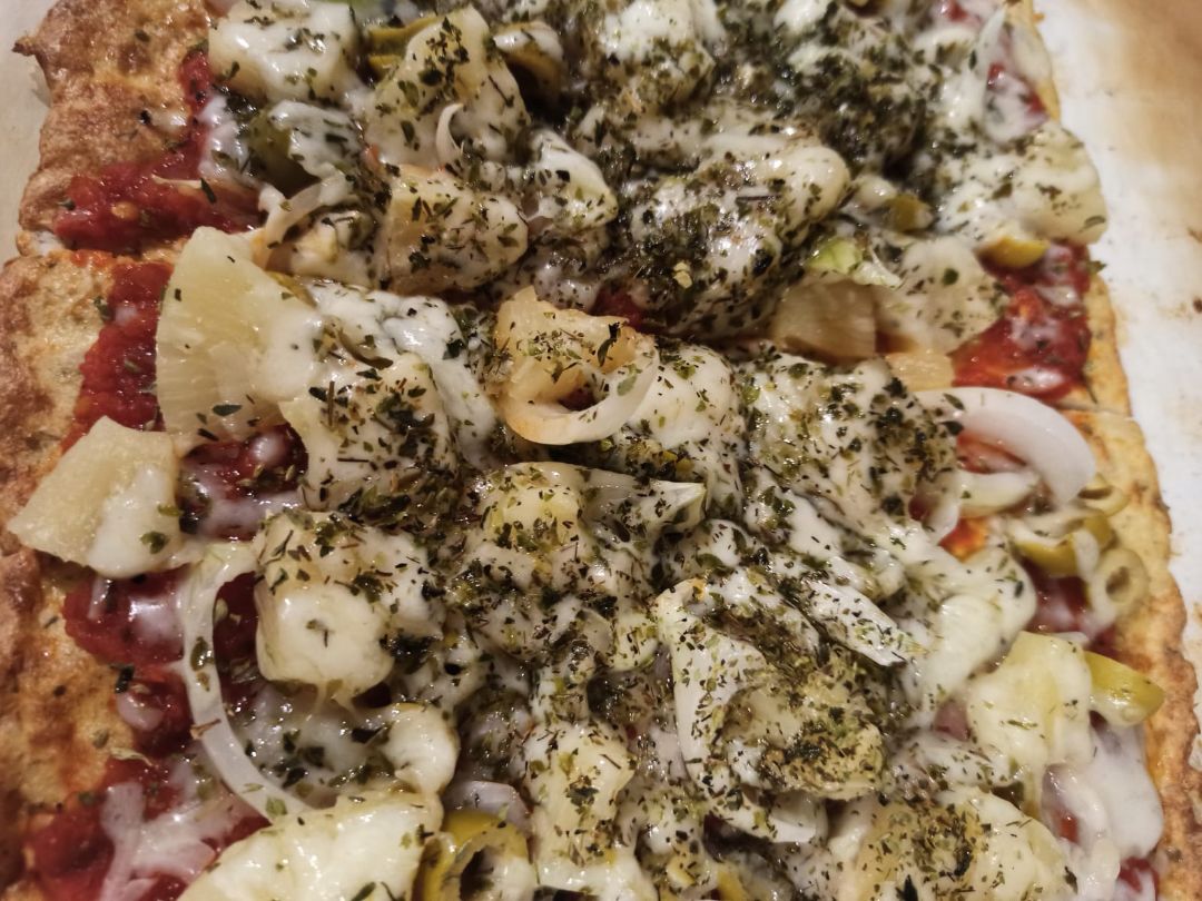 Pizza con base de pollo Pizza con base de pollo