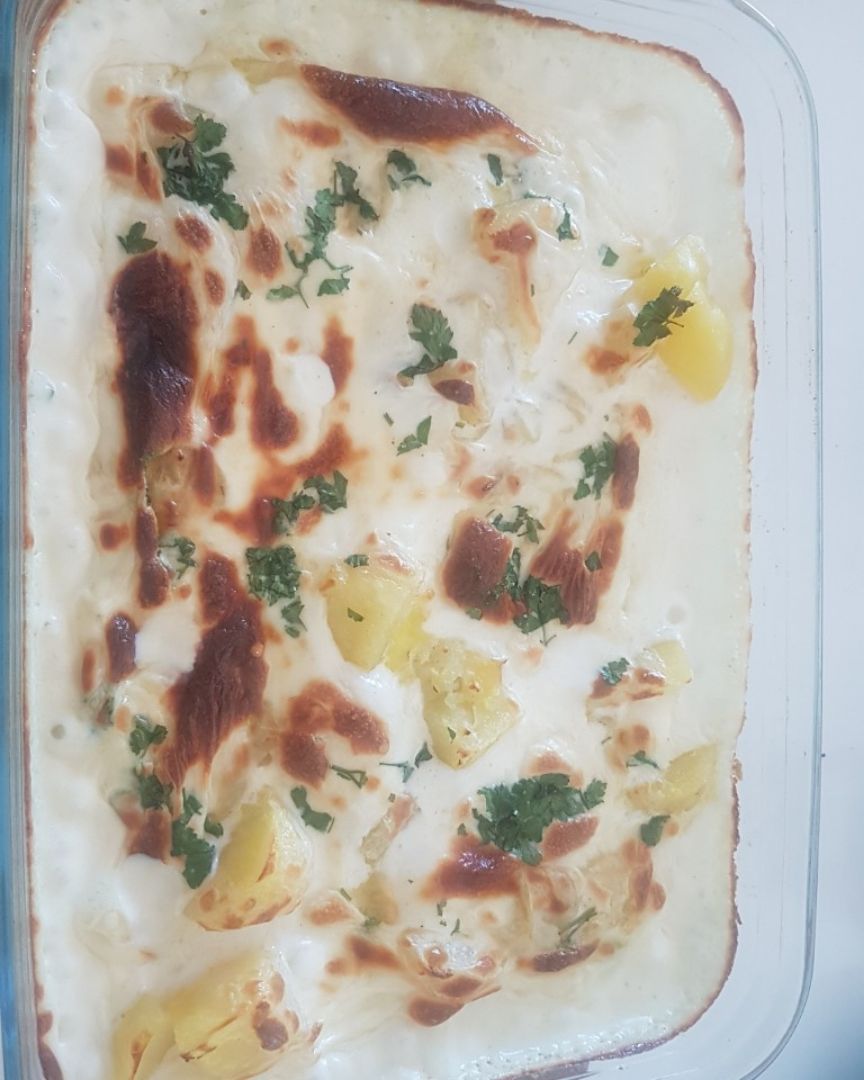 Merluza con bechamel 