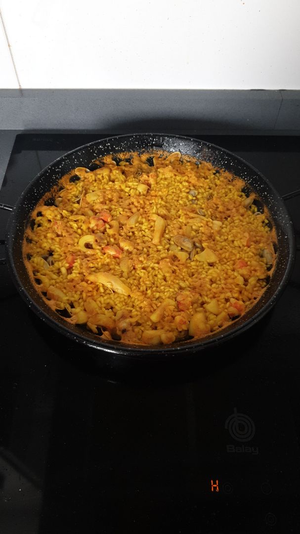 Arroz con sepia, coquinas y gambones Arroz con sepia, coquinas y gambones