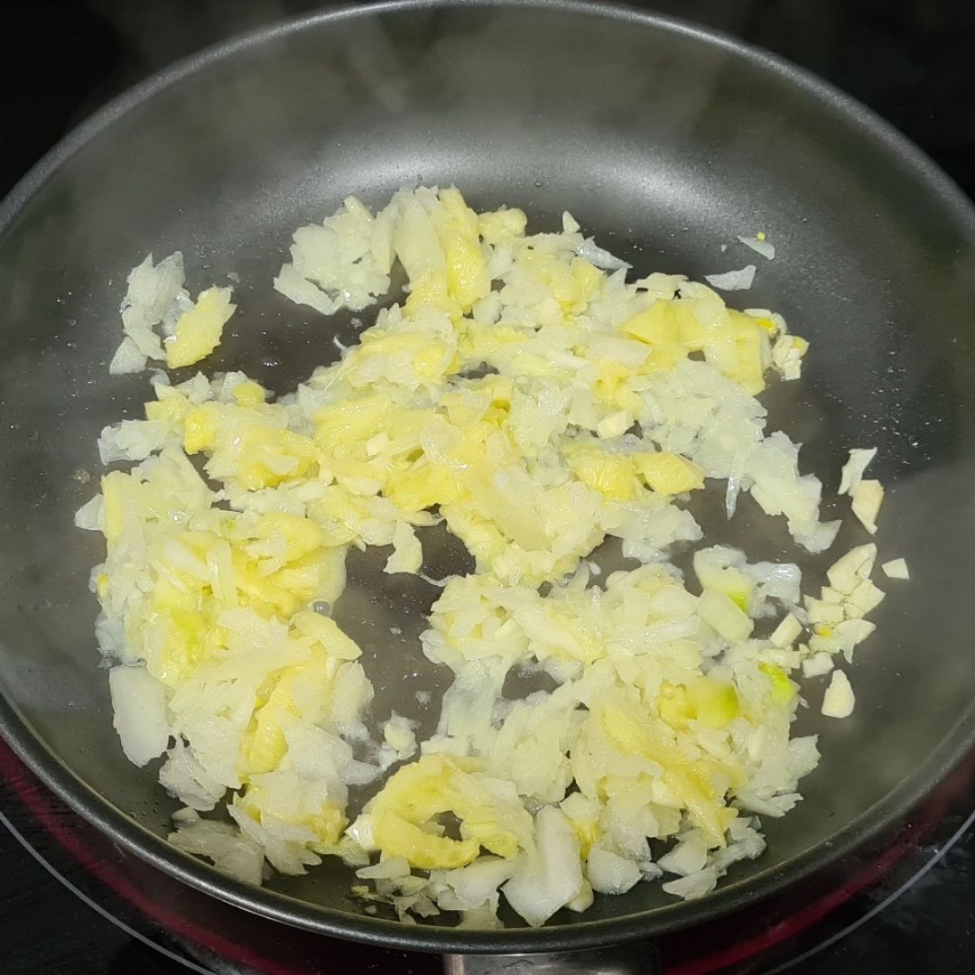 Calabacin relleno de pollo y verduras.Step 0