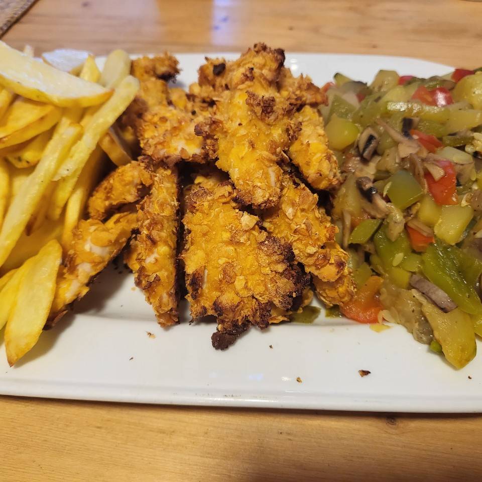 Nuggets al horno con patatas y verduras Nuggets al horno con patatas y verduras