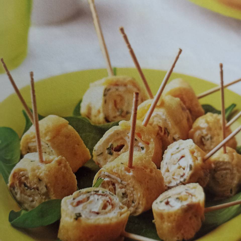 Rollitos de tortilla, queso y pavo Rollitos de tortilla, queso y pavo