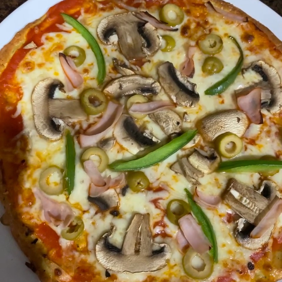 Pizza con base de pollo 