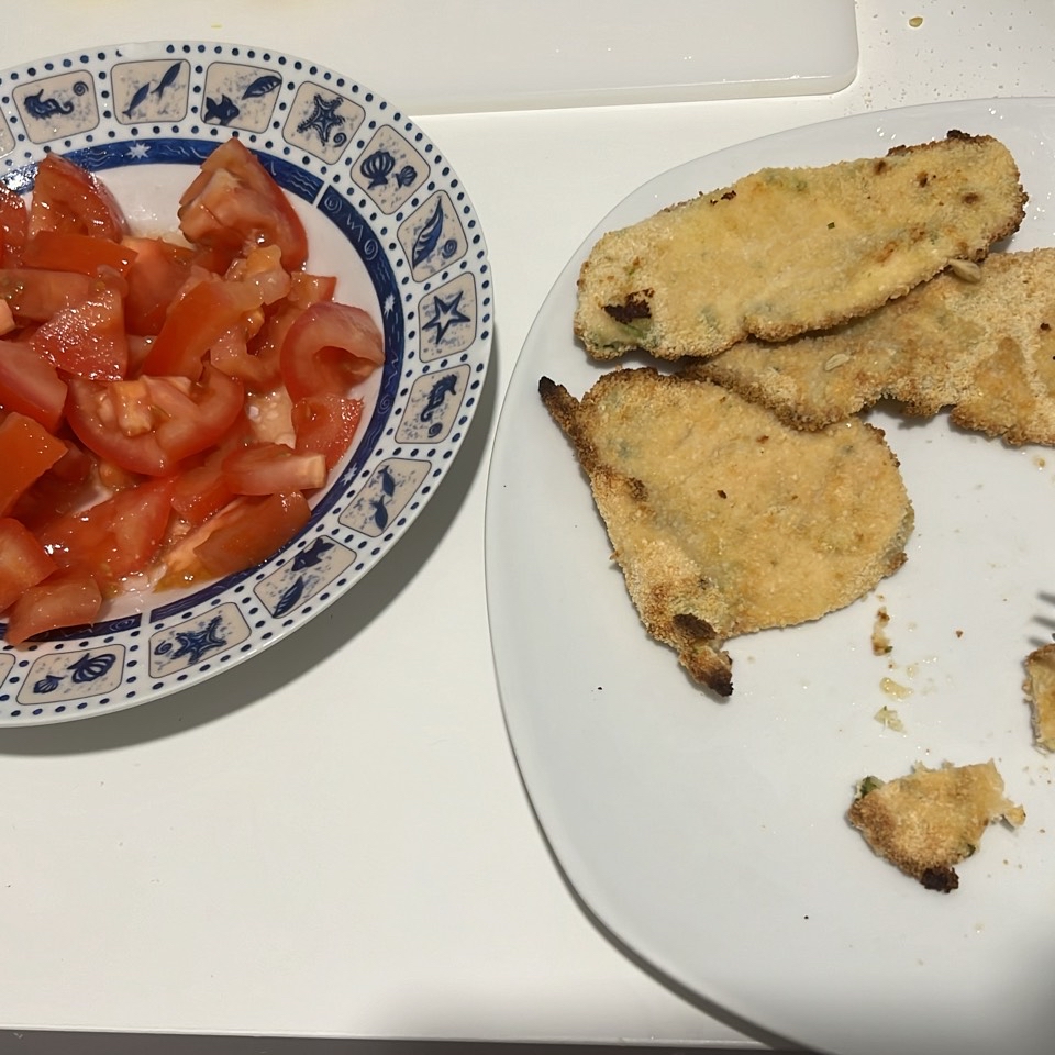 Milanesas de pollo con tomate
