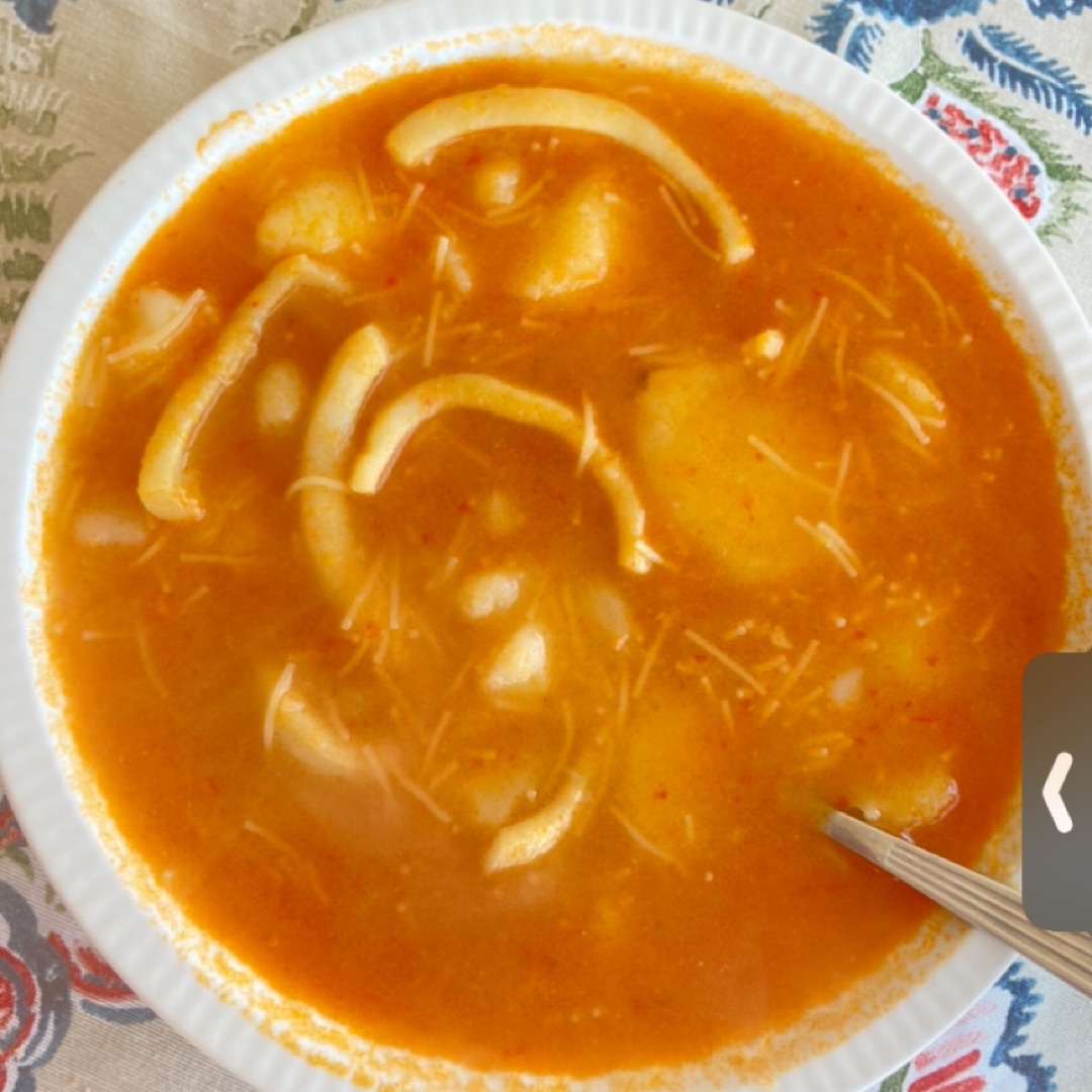 Guiso de patatas y pota Guiso de patatas y pota