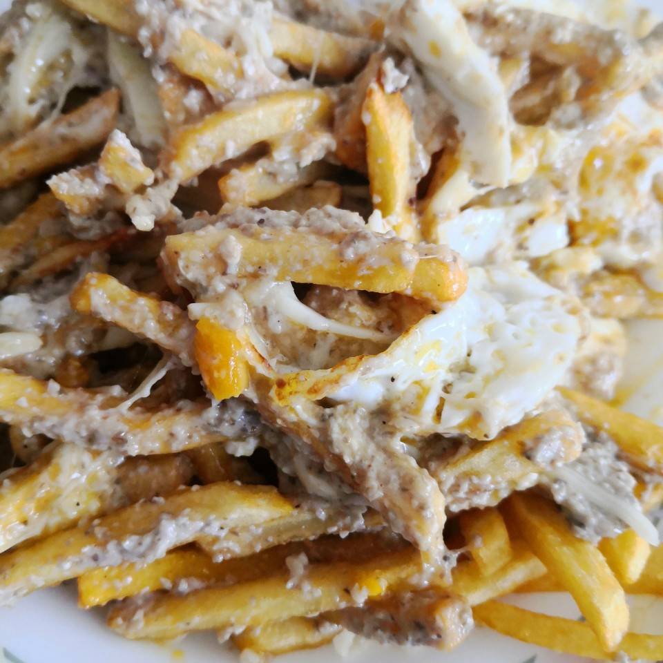 Patatas con setas y queso