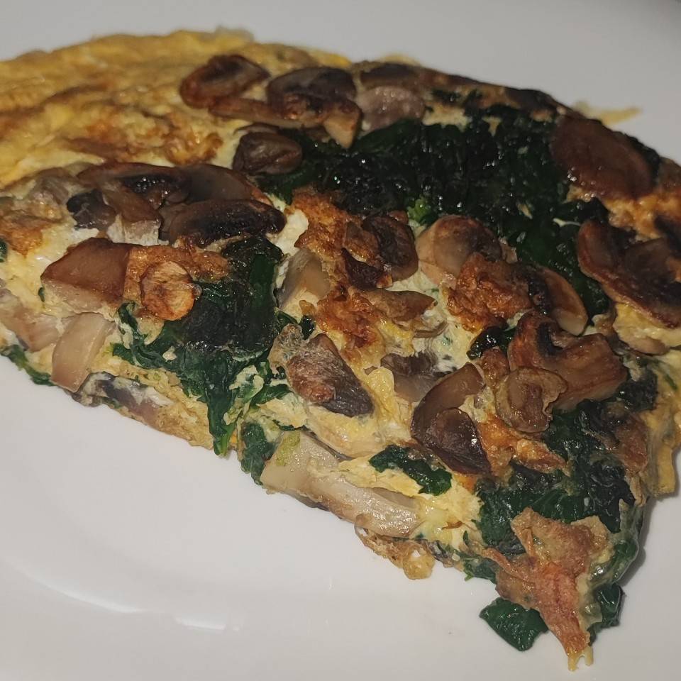Tortilla de espinacas y champiñones Tortilla de espinacas y champiñones