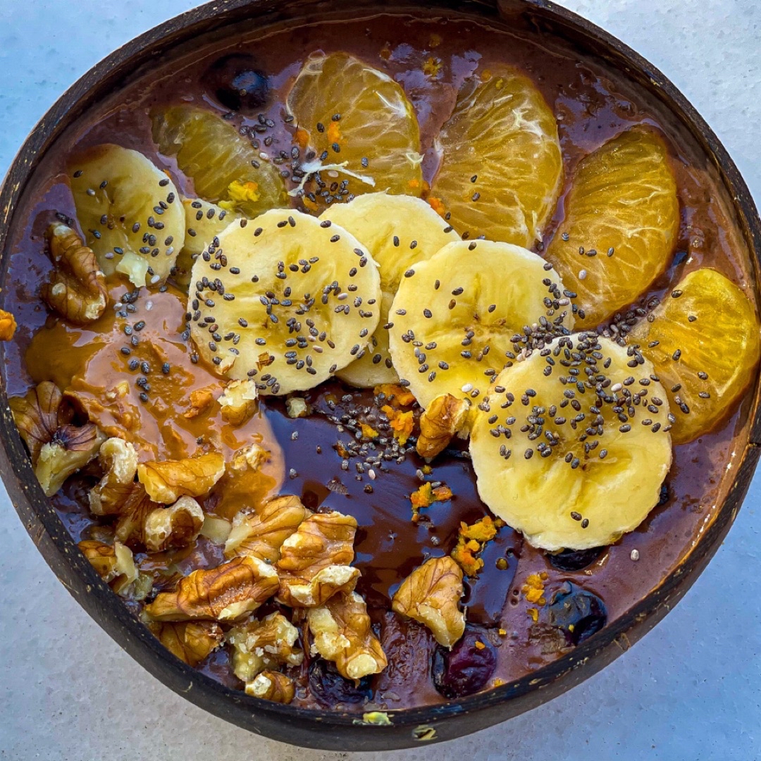Porridge con cacao, naranja, plátano y frutos secos
