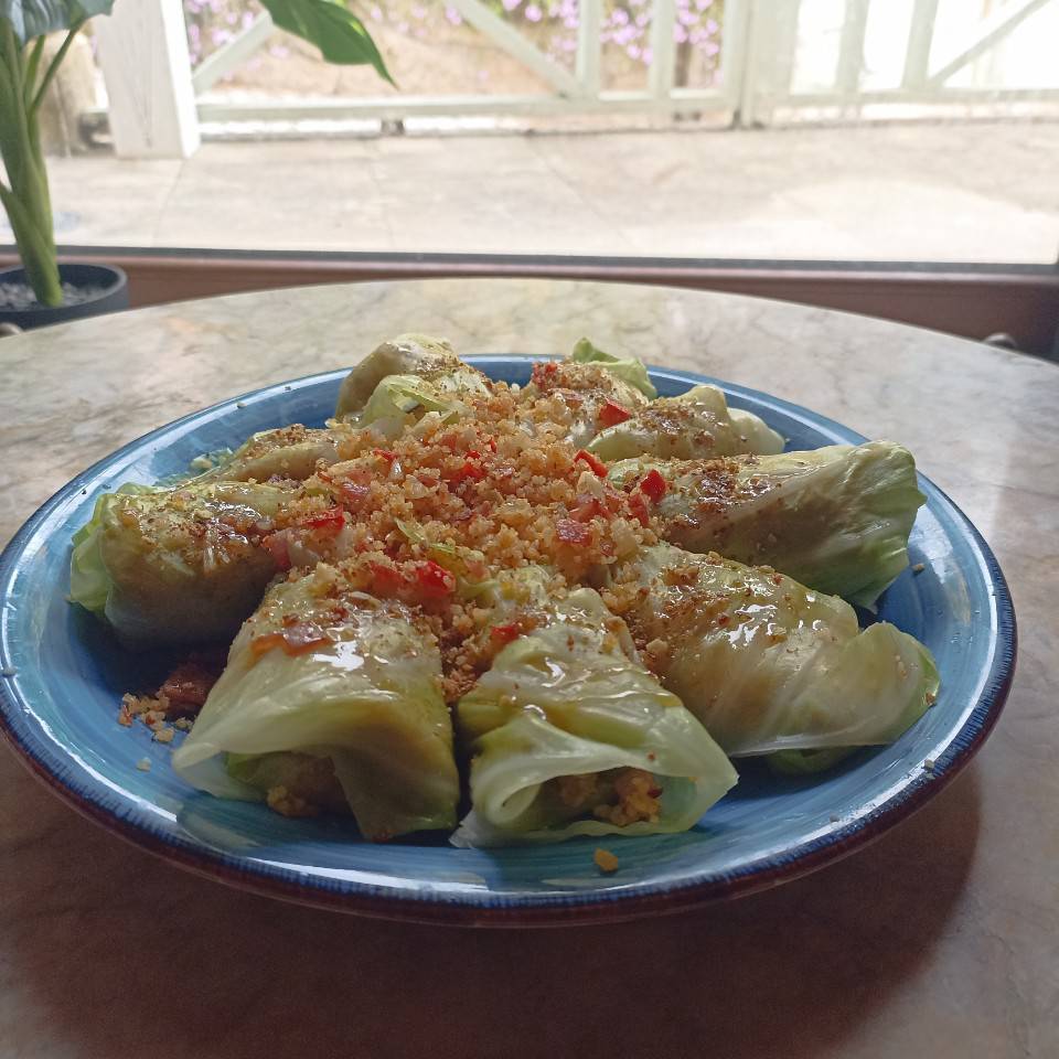 Rollitos de col relleno de couscous